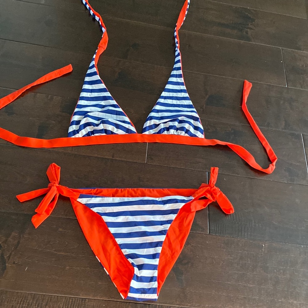 Double sided two piece swim suit. Tags cut off. Bough on 6pm.com